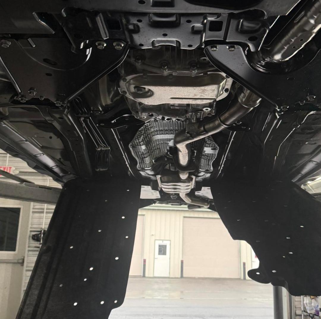Woolwax undercoating sprayed across the frame and undercarriage